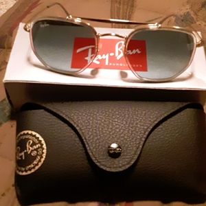 Ray Ban Sunglasses with sky blue tent